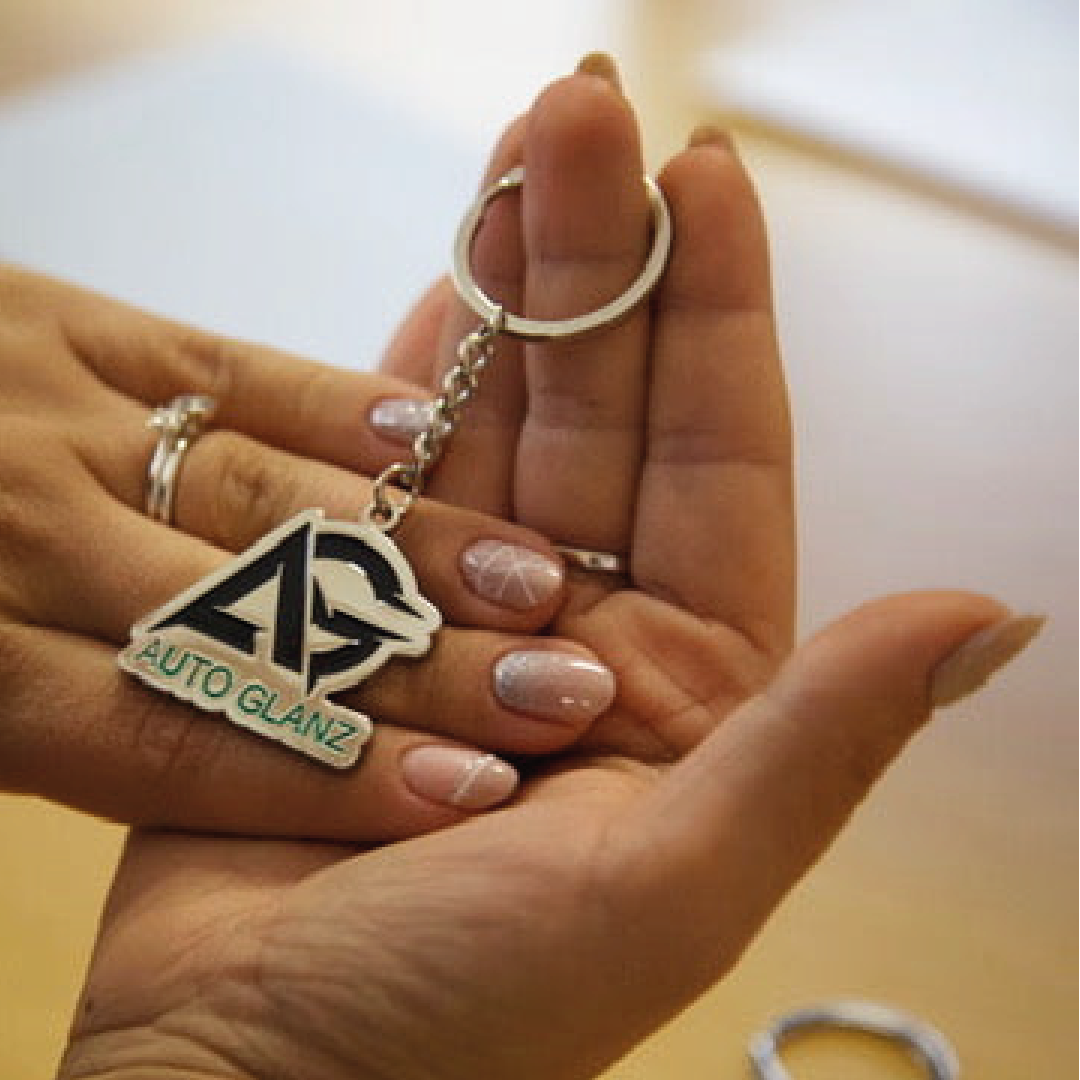 Metalen sleutelhanger met Auto Glanz-logo